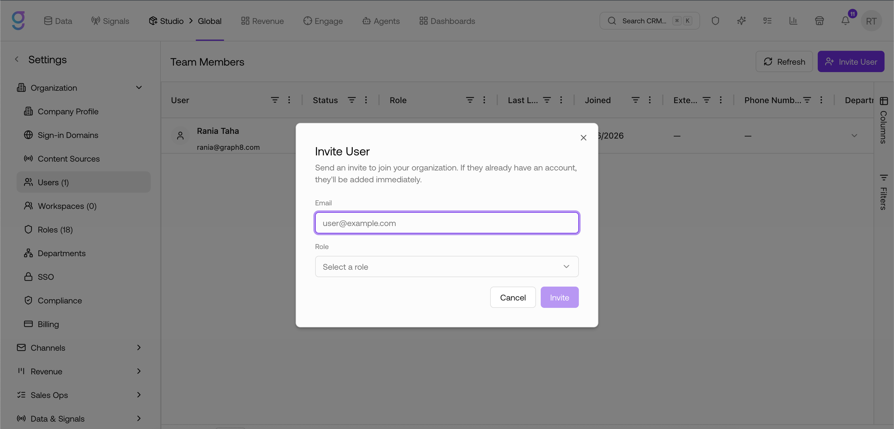The Users page under Settings → Organization, with the Invite User dialog open